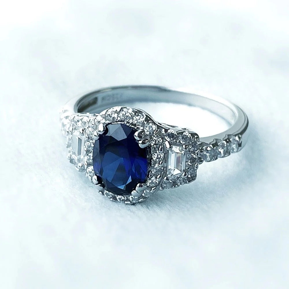 Sterling Silver Simulated Blue Sapphire Cubic Zirconia Halo Ring, Rhodium Plated Size 6 D8941